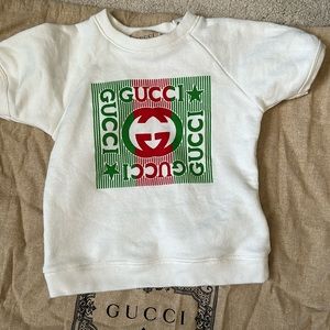 Gucci short sleeves infant sweater size 6/9 months. Cream with red/green GG logo